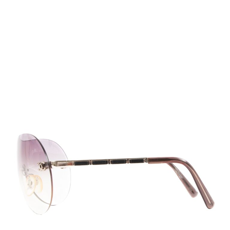 CHANEL Vintage 1990s #4009 Rimless Sunglasses - Purple– Wag N' Purr Shop