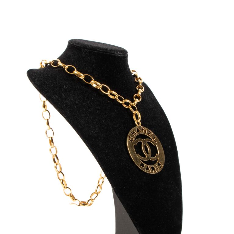Chanel Vintage Gold CC Cut Out Medallion Necklace Labellov Buy and Sell Authentic Luxury
