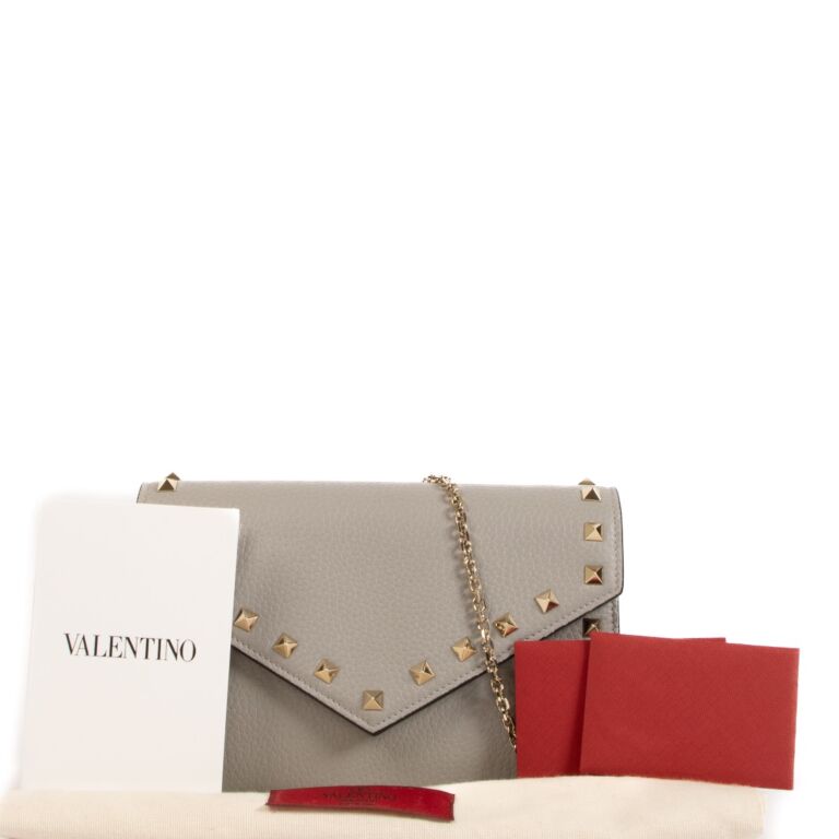 Valentino Garavani Rockstud Grey Wallet On Chain Labellov Buy and Sell Authentic Luxury