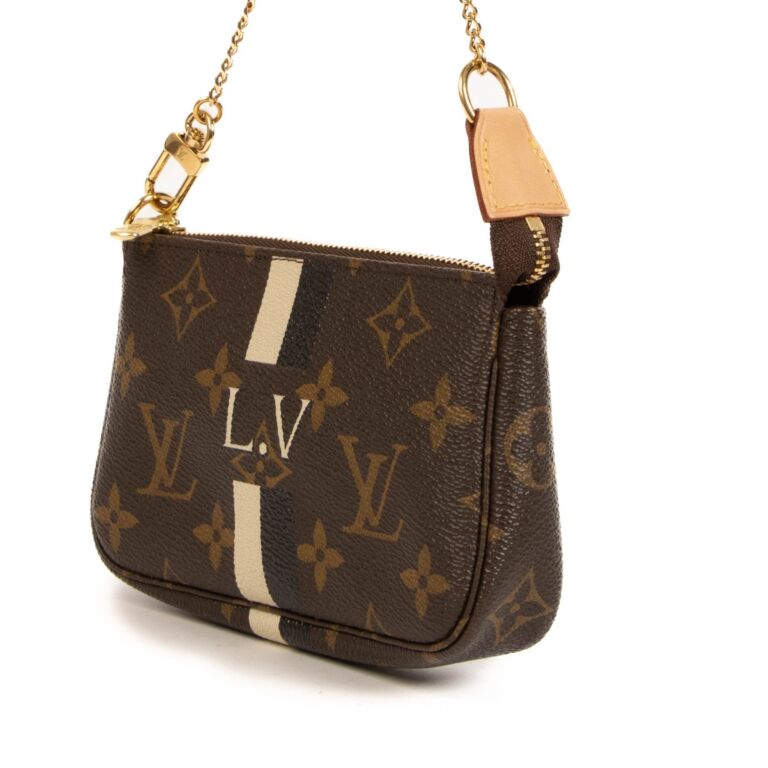 Louis vuitton mini pochette sold 2025 out