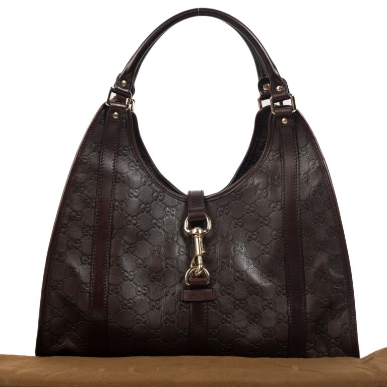 Gucci Brown Monogram Embossed Jackie Shoulder Bag Labellov Buy and Sell Authentic Luxury