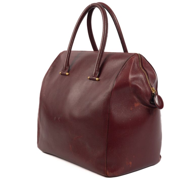 Cartier Burgundy Leather Travel Bag Labellov Buy and Sell Authentic Luxury