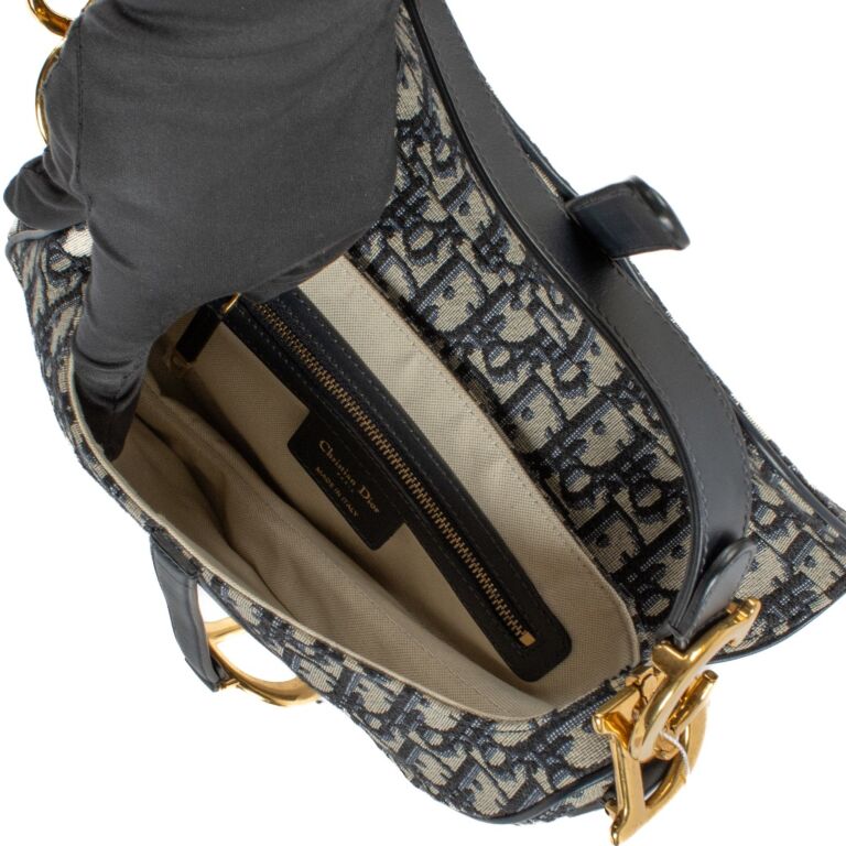 Christian Dior Oblique Canvas Saddle Bag Labellov Buy and Sell Authentic Luxury