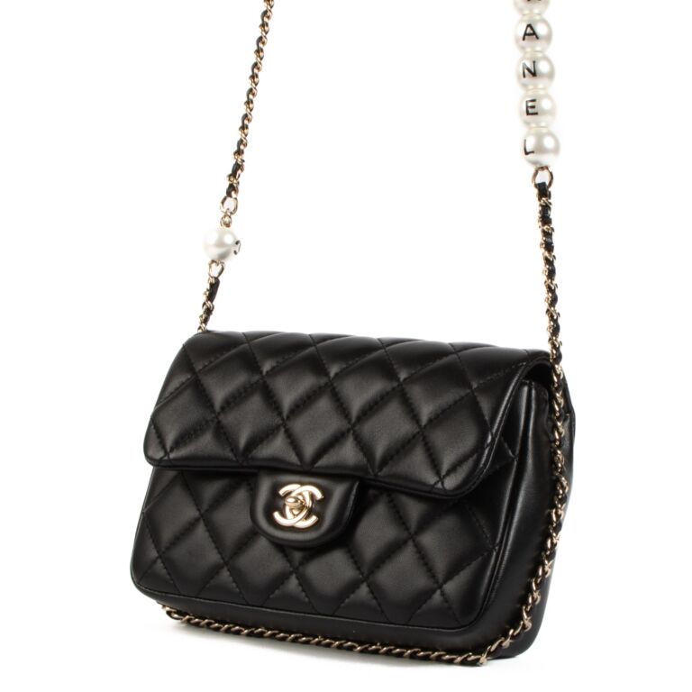 Chanel Black Lambskin Logo Pearl Flap Bag Labellov Buy and Sell Authentic Luxury