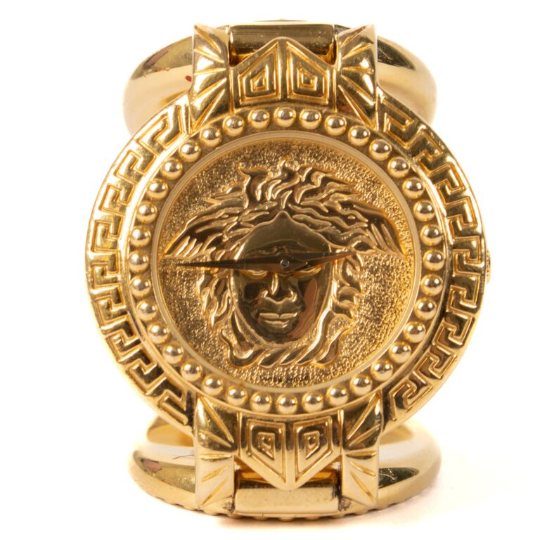 Gianni Versace Vintage Gold Plated Medusa Signature Coin Watch Labellov Buy and Sell Authentic Luxury