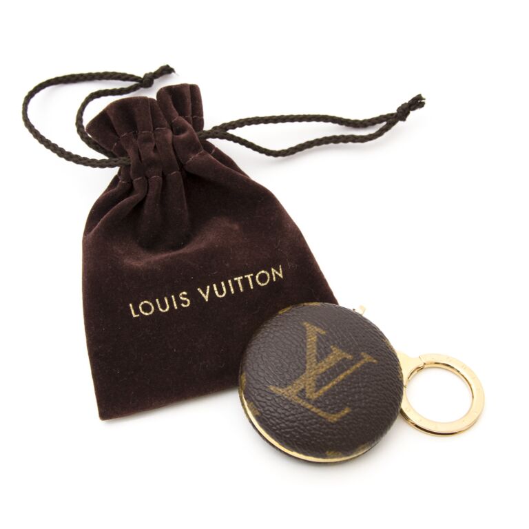 Preloved Louis Vuitton key ring Astropill flash light & bag charm