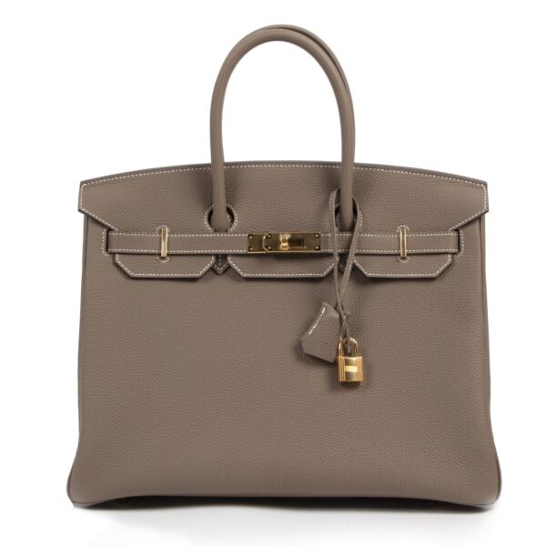 Hermès Birkin 35 Togo Etoupe GHW for the best price at Labellov. We buy and sell your preloved and brand new designer bags for the best price.