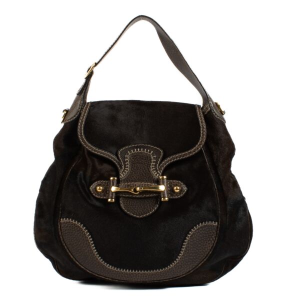 Gucci Brown Pony Hair Pelhalm Bag for the best price at Labellov secondhand luxury in Antwerp. Koop en verkoop aan de beste prijs bij Labellov.