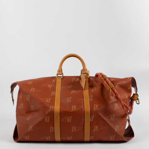 shop 100% authentic second hand Louis Vuitton 1995 LV America's Cup Red Canvas Keepall 60 Bag on Labellov.com