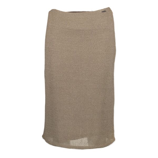 Are you looking for an authentic Chanel Beige Pencil Skirt? We buy and sell your designer items
