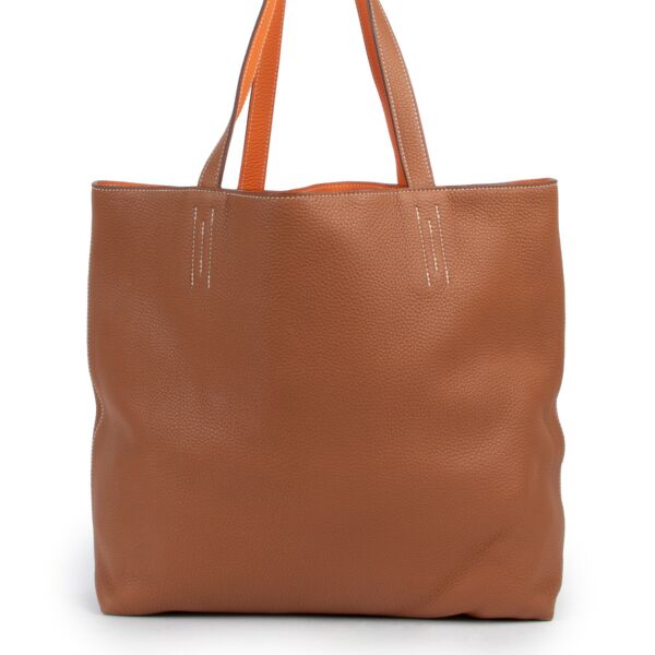 Hermès Double Sens 45 Gold & Orange Clemence reversible for the best price at Labellov secondhand luxury in Antwerp Belgium