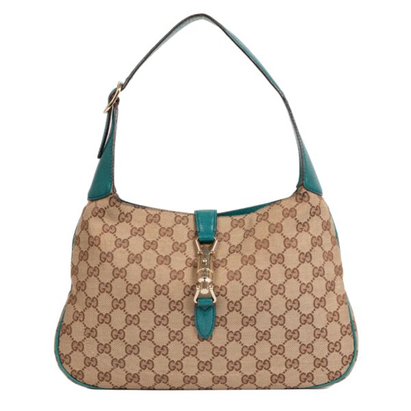  Are you looking for an authentic Gucci Monogram Canvas and Leather New Jackie Shoulder Bag?