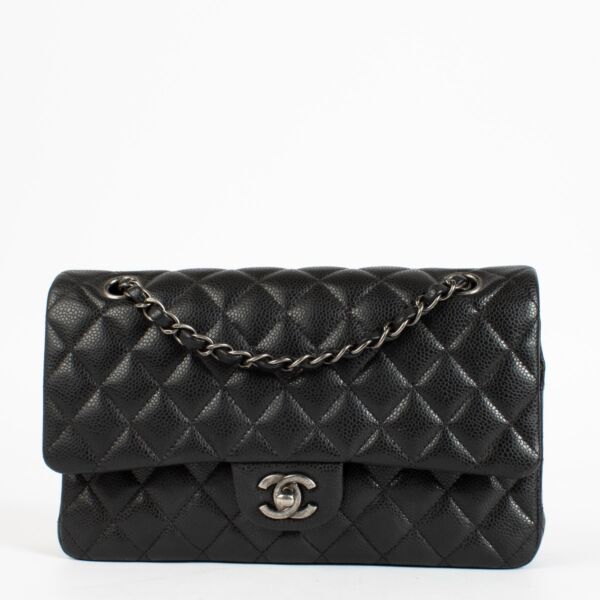 Authentic pre-loved Chanel Black Caviar Medium Classic 11.12 Handbag on Labellov.com