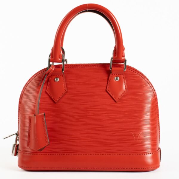Authentic preloved Louis Vuitton Red Epi Alma BB Bag on Labellov.com