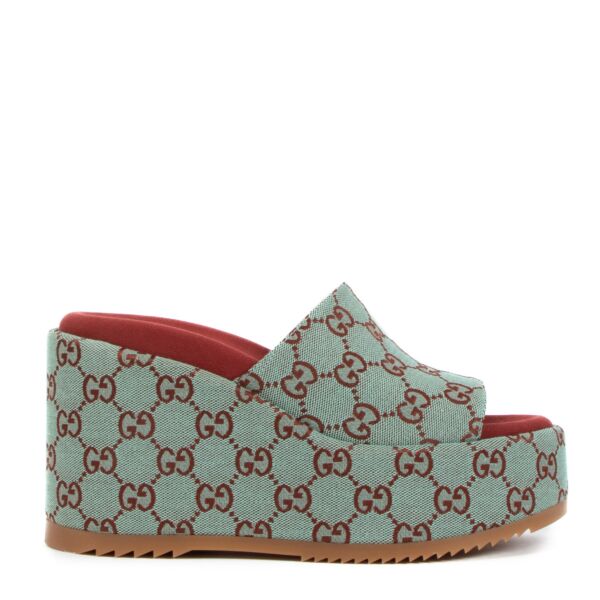 Are you looking for an authentic pair of designer Gucci Blue GG Supreme Platform Slide Sandals - Size 38? 