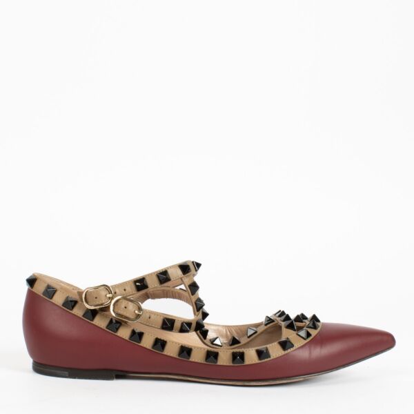 Shop the authentic Valentino Garavani Rockstud Burgundy Flats at Labellov.com