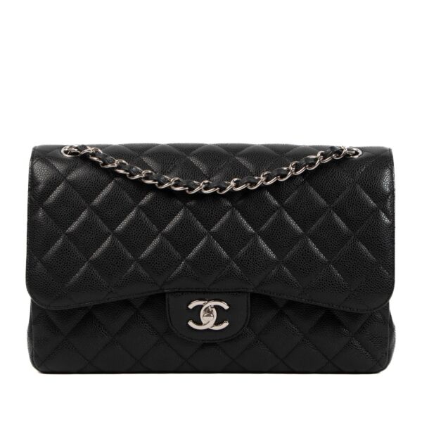 Shop 100% authentic second-hand Chanel Black Caviar Classic Flap Bag on Labellov.com