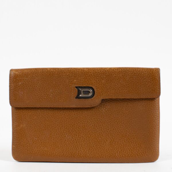 Shop 100% authentic second hand Delvaux Camel Pouch on Labellov.com