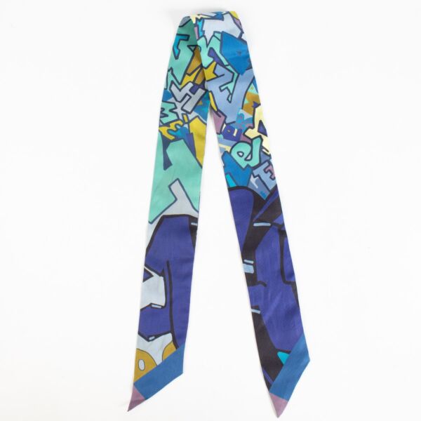 authentic preloved Hermès Multicolor Twilly Scarf on Labellov.com