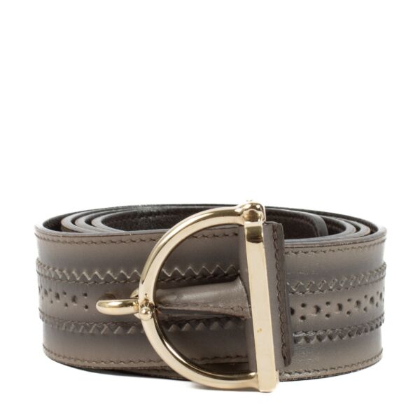 Stylish gray belt with gold hardware, size 95. As good as new with minimal signs of wear. Shop at Labellov.