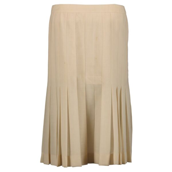 Shop 100% authentic Chanel Beige Pleated Skirt at Labellov.com.