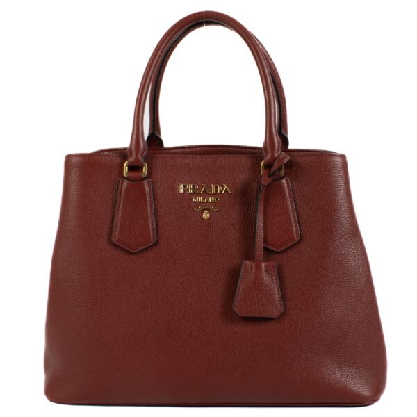 Shop 100% authentic Prada Burgundy Top Handle bag at Labellov.com.
