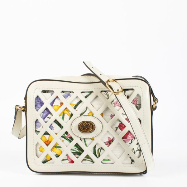 Authentic preloved Gucci White Cutout Leather Floral Canvas Bag on Labellov.com