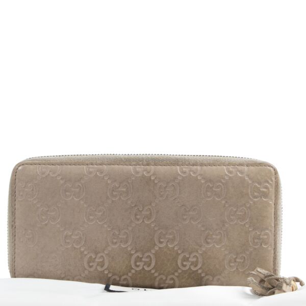 Gucci Monogram Embossed Zipper Wallet