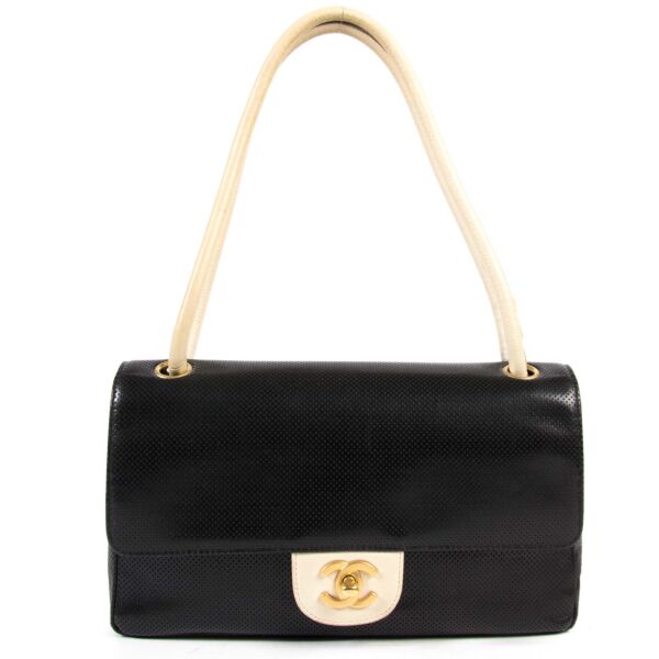 chanel black & white drill perforated leather flap shoulder bag now for sale at labellov vintage fashion webshop belgium