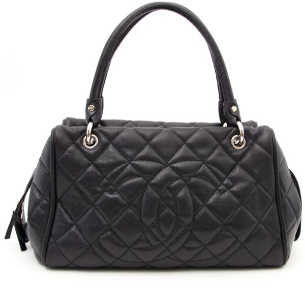 Looking for a Chanel Black Caviar Shopping Tote Bag? 