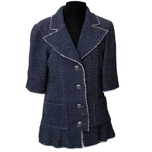 Chanel Blue Fantasy Tweed Jacket - Size 38 Buy authentic designer Chanel secondhand blazer jacket at Labellov at the best price. Safe and secure shopping. Koop tweedehands authentieke Chanel kleding kledij bij designer webwinkel labellov.