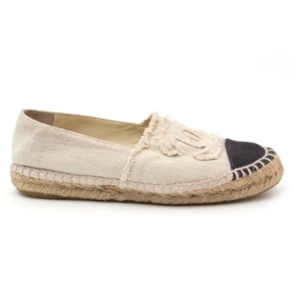 Chanel Toile Espadrilles Beige Black musthave this season, now for sale at luxury webshop LabelLOV.com.
