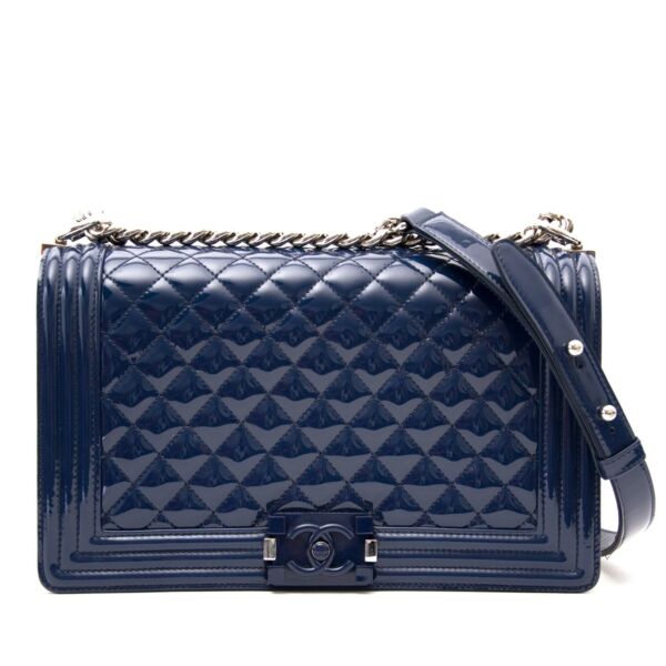 Buy safe the Chanel blue patent leather boy bag on www.labelcrush.com or visit the showroom in Antwerp