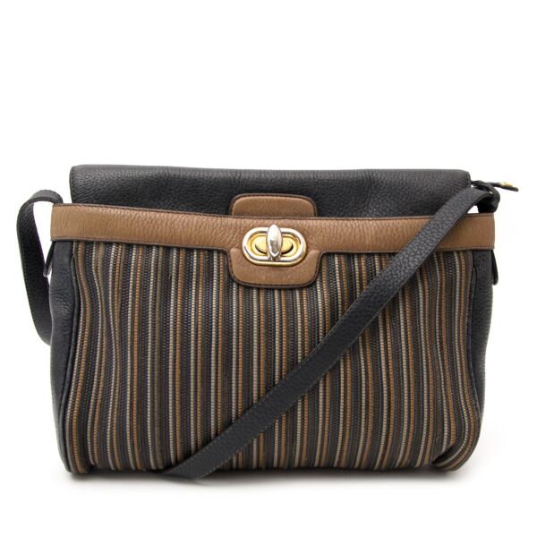 Buy your authentic Delvaux Toile de Cuir Cross Body Bag for the best price available