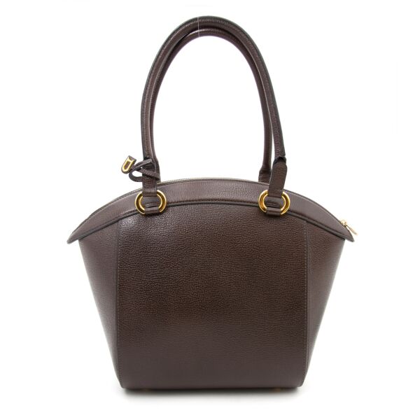 Delvaux Brown Pebbled Leather Bag for the best price available online.