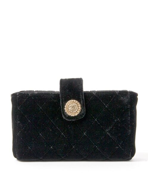 Authentic Chanel Black Quilted Velvet Mini Purse Clutch Darling mini Chanel clutch or purse. In thick, rich black velours with golden logo button. 