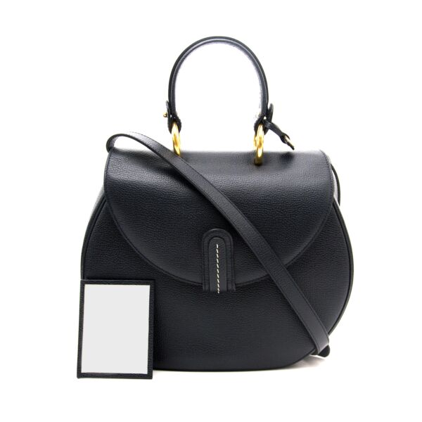Delvaux Dark Blue Top Handle Bag online for sale for the best price. Buy and sell your designer bags with Labellov.