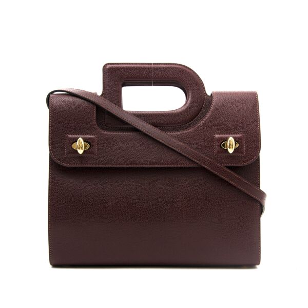 Delvaux Burgundy D Handle Bag for the best price online available. Buy your secondhand bags safe and secure on Labellov.