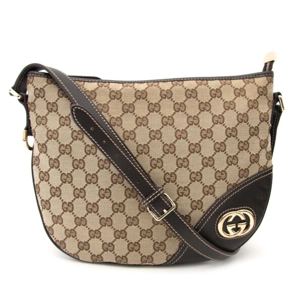 Buy now safe and secure a Gucci monogram cross body on www.labellov.com