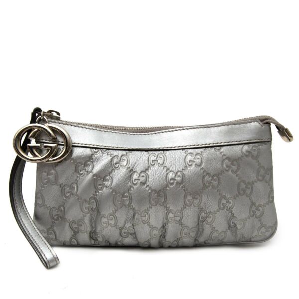 Buy your authentic Gucci Silver Monogram Pochette