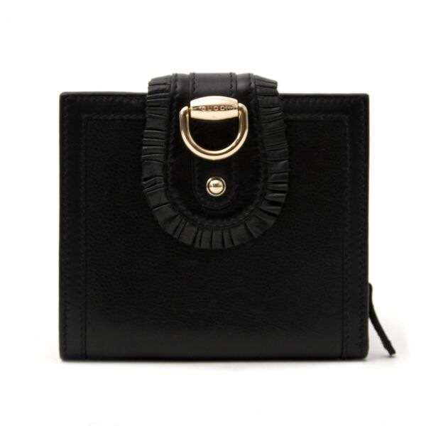 Gucci Black Ruffle Hem Wallet for sale online at Labellov