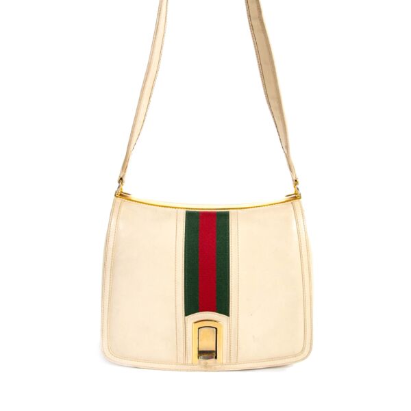 Buy your 100% authentic Gucci Vintage Web Cream Shoulder Bag for the best price at Labellov secondhand luxury