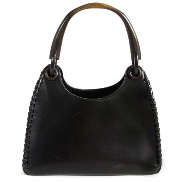 Delvaux Black Leather Bag with Wooden Handle for sale online at Labellov