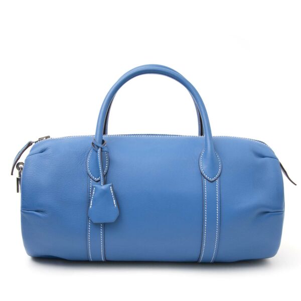 acheter en ligne pour le meilleur prix sac a main The lock opens to a spacious matte leather interior with zipper and patch pockets. This fresh take on the iconic Lockit bag is a chic choice for day or evening with the luxury and style of 