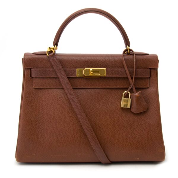 koop online Hermes Kelly 32 Marron Ardennes aan de beste prijs wereldwijd shippen 