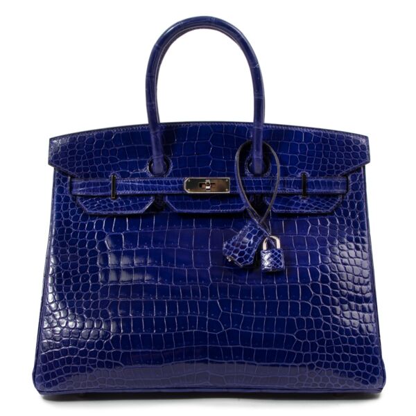 Authentic second hand luxury designer Hermès Birkin 35 Bleu Electrique Shiny Crocodile Porosus Lisse Palladium Hardware on labellov.com