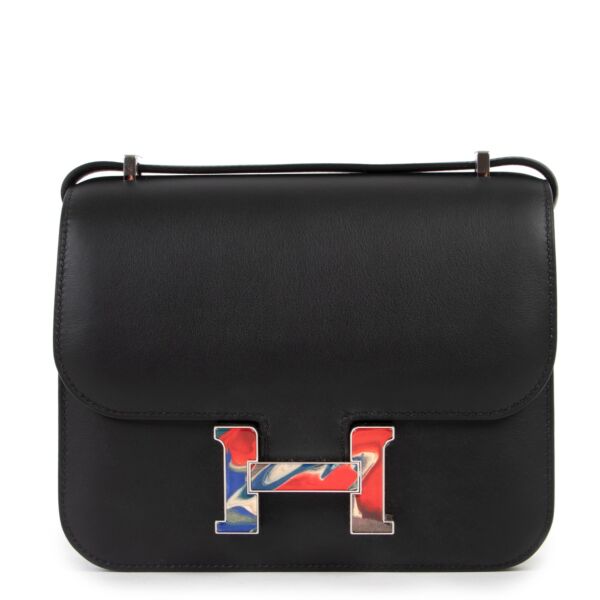 Buy and sell safe online this rare Hermes constance mini with marble lock