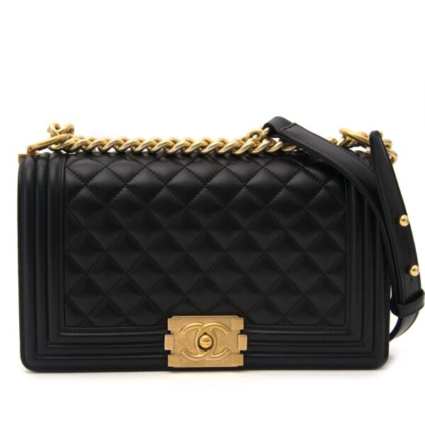 Buy and sell your designer items at labellov Chanel Black Boy Medium GHW