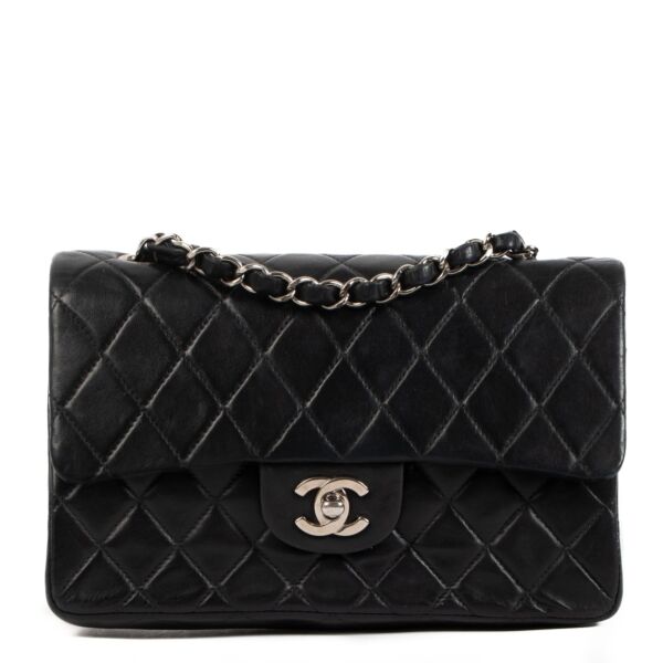 Shop a 100% authentic Chanel Black Lambskin Classic Flap Bag Small on Labellov.com.