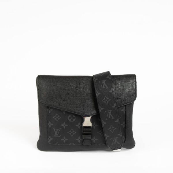 Authentic pre-loved Louis Vuitton Taigrama Outdoor Flap Crossbody Bag on Labellov.com
